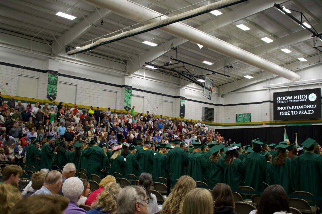 Graduates of 2023 stand for their ceremony